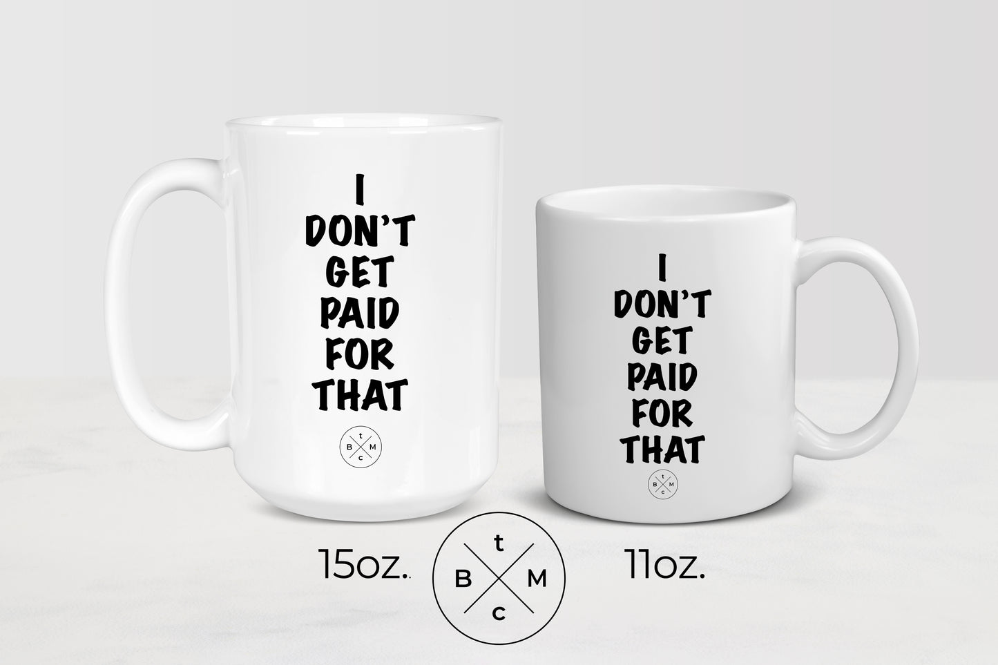 11 ounce and 15 ounce white ceramic mug with black text I don’t get paid for that
