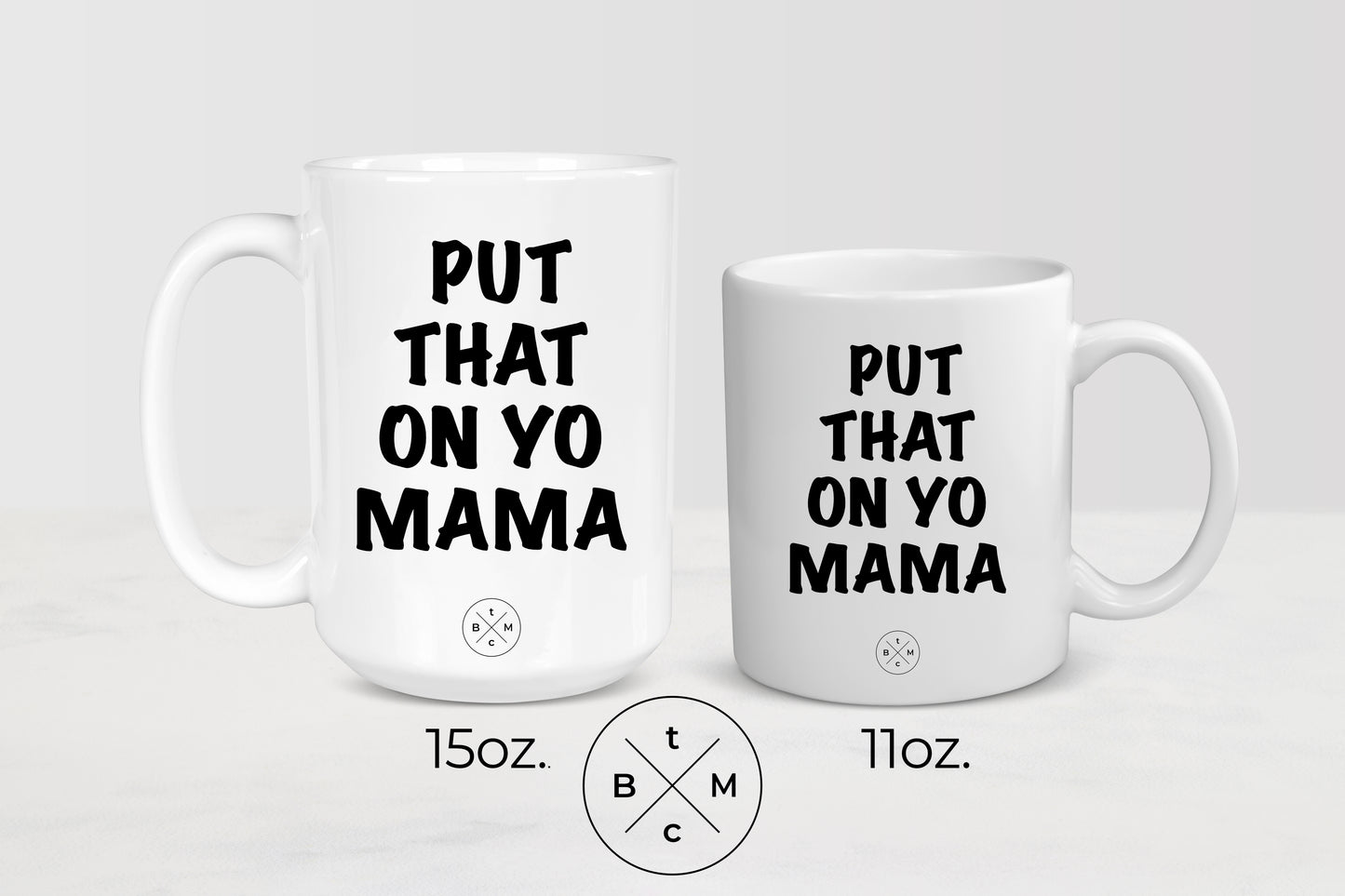 White 11 ounce and 15 ounce mugs with black text put that on yo mama