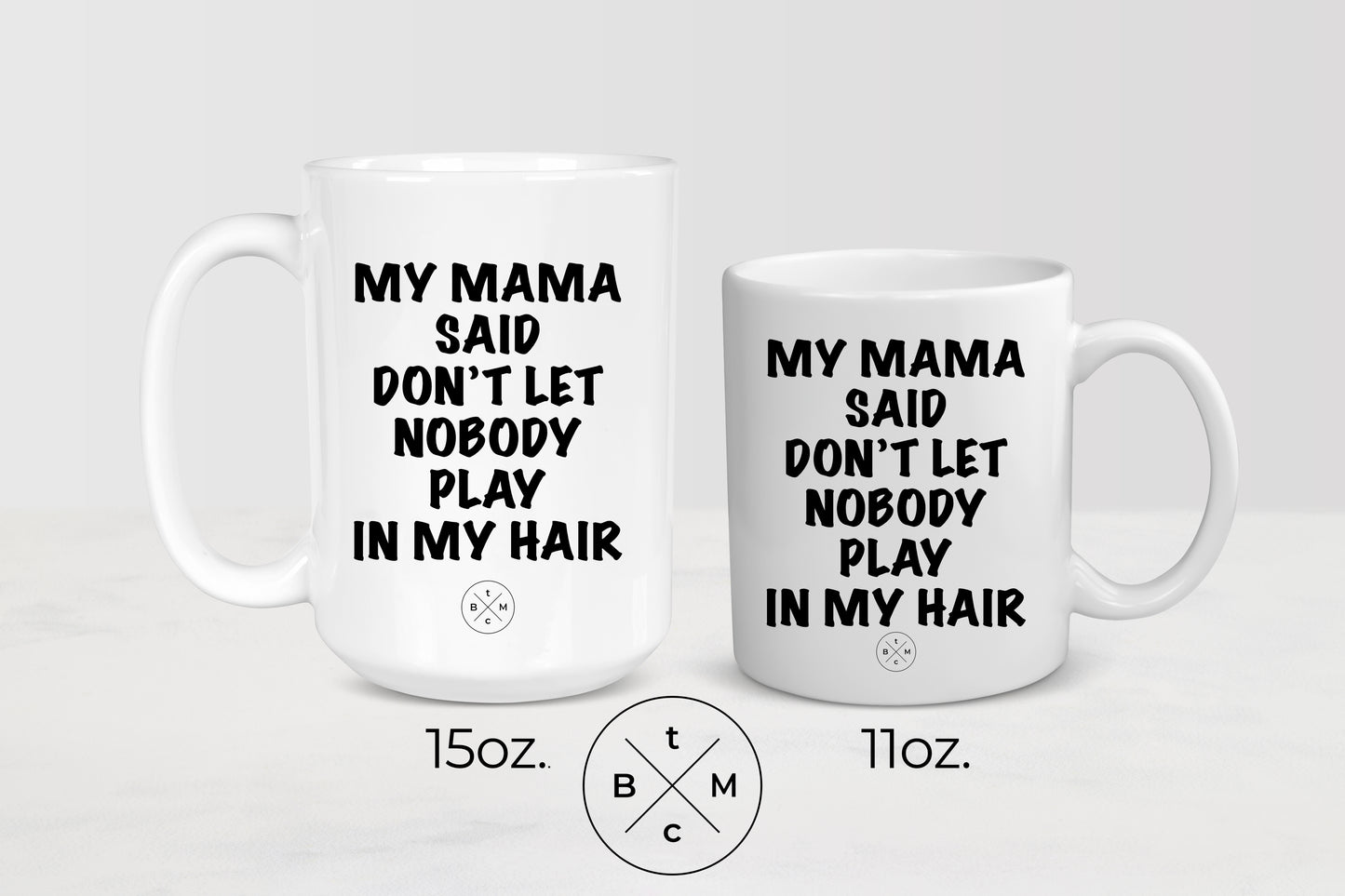 11 ounce and 15 ounce white ceramic mugs with black text my mama said don’t let nobody playing my hair