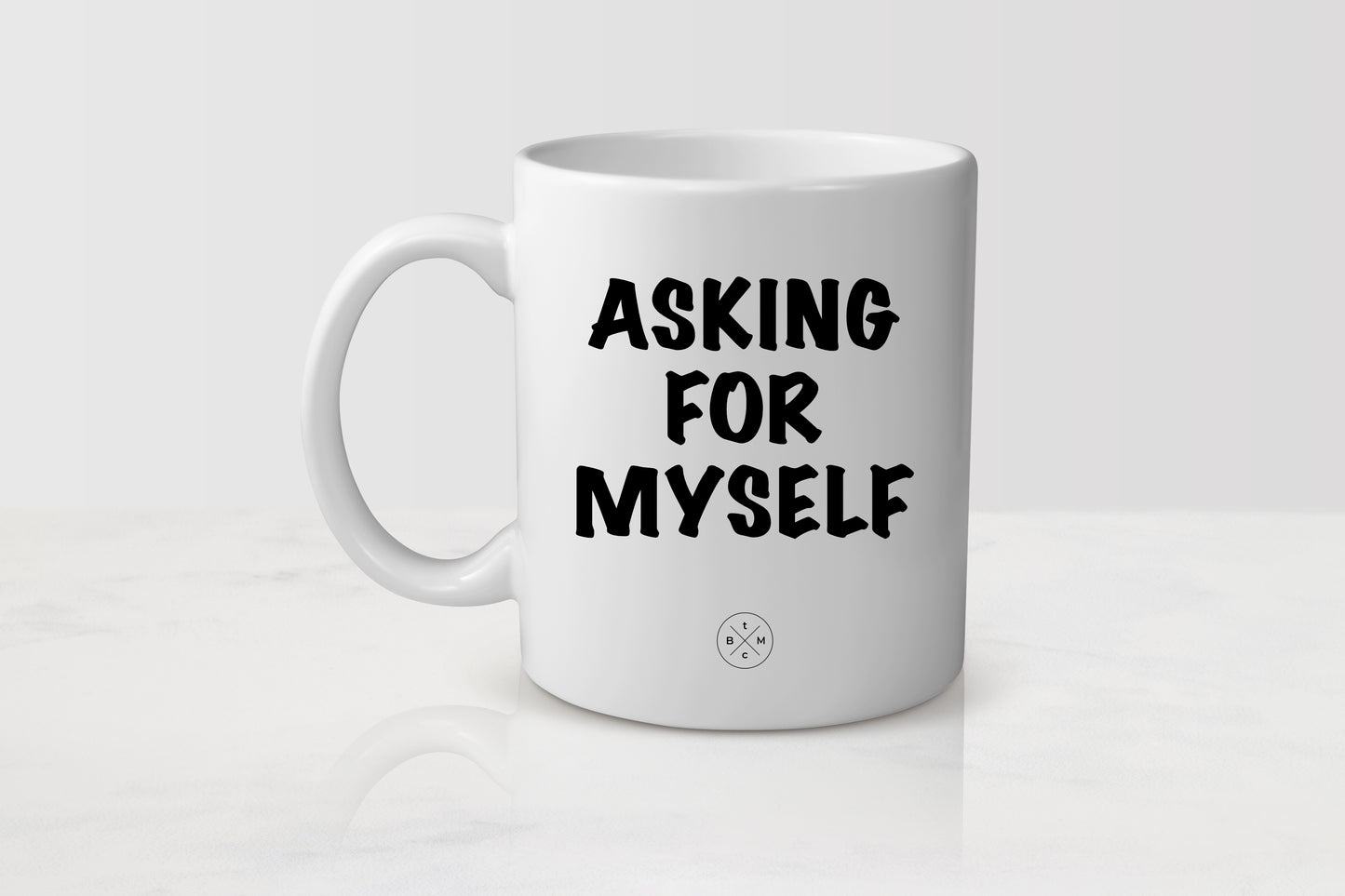 White 11 ounce ceramic mug with black text asking for myself