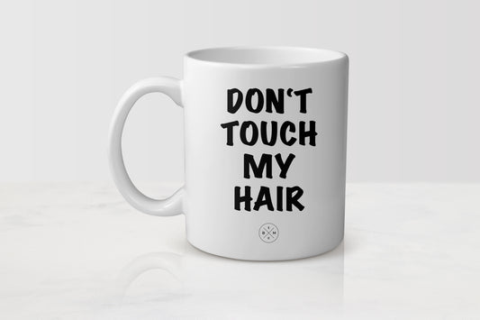 11 ounce white ceramic mug with black text don’t touch my hair