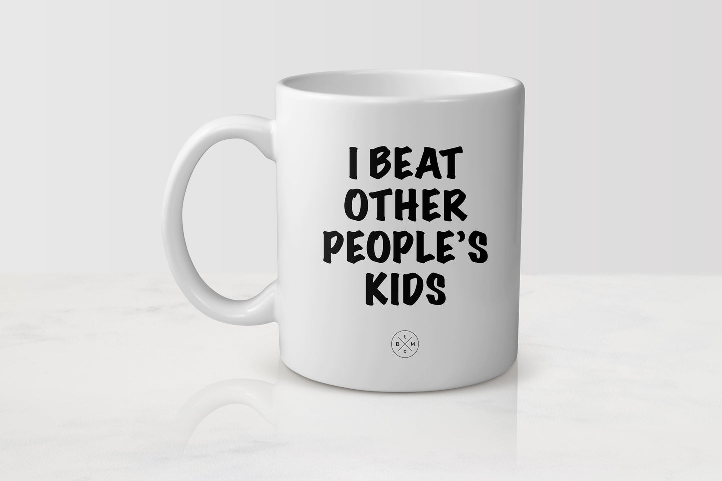 White 11 ounce ceramic mug with black text I beat other people’s kids