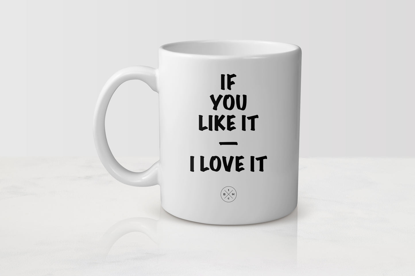 White 11 ounce ceramic mug with black text if you like it I love it