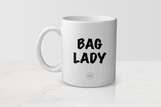 11 ounce white ceramic mug with black text bag lady