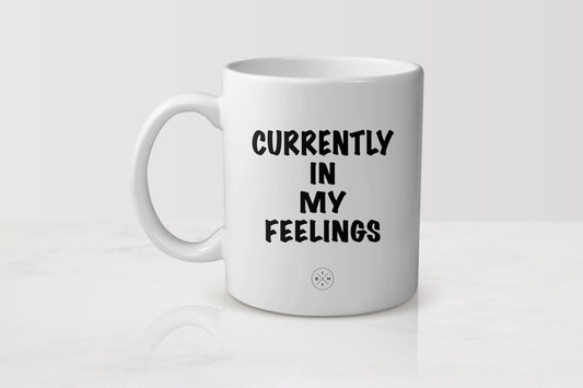11 ounce white ceramic mug with black text currently in my feelings