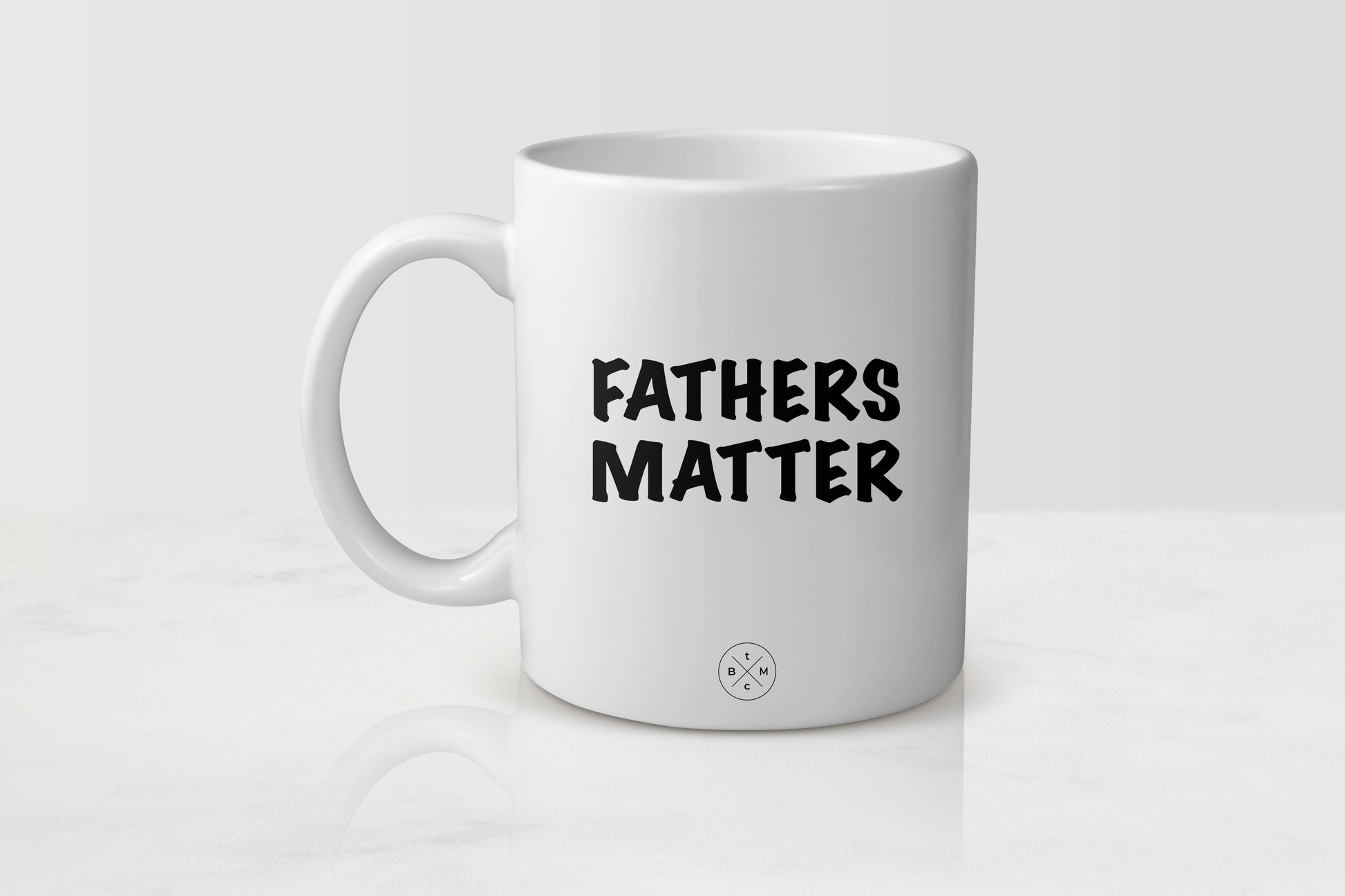 11 ounce white ceramic mug with black text fathers matter