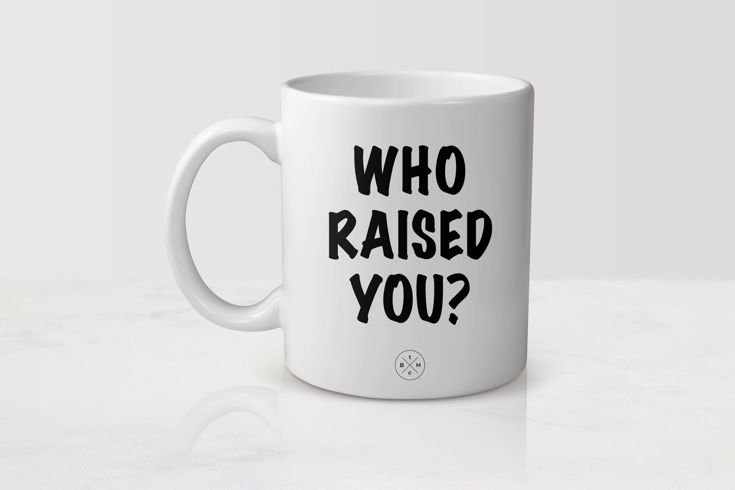 11oz white ceramic mug with black text who raised you?