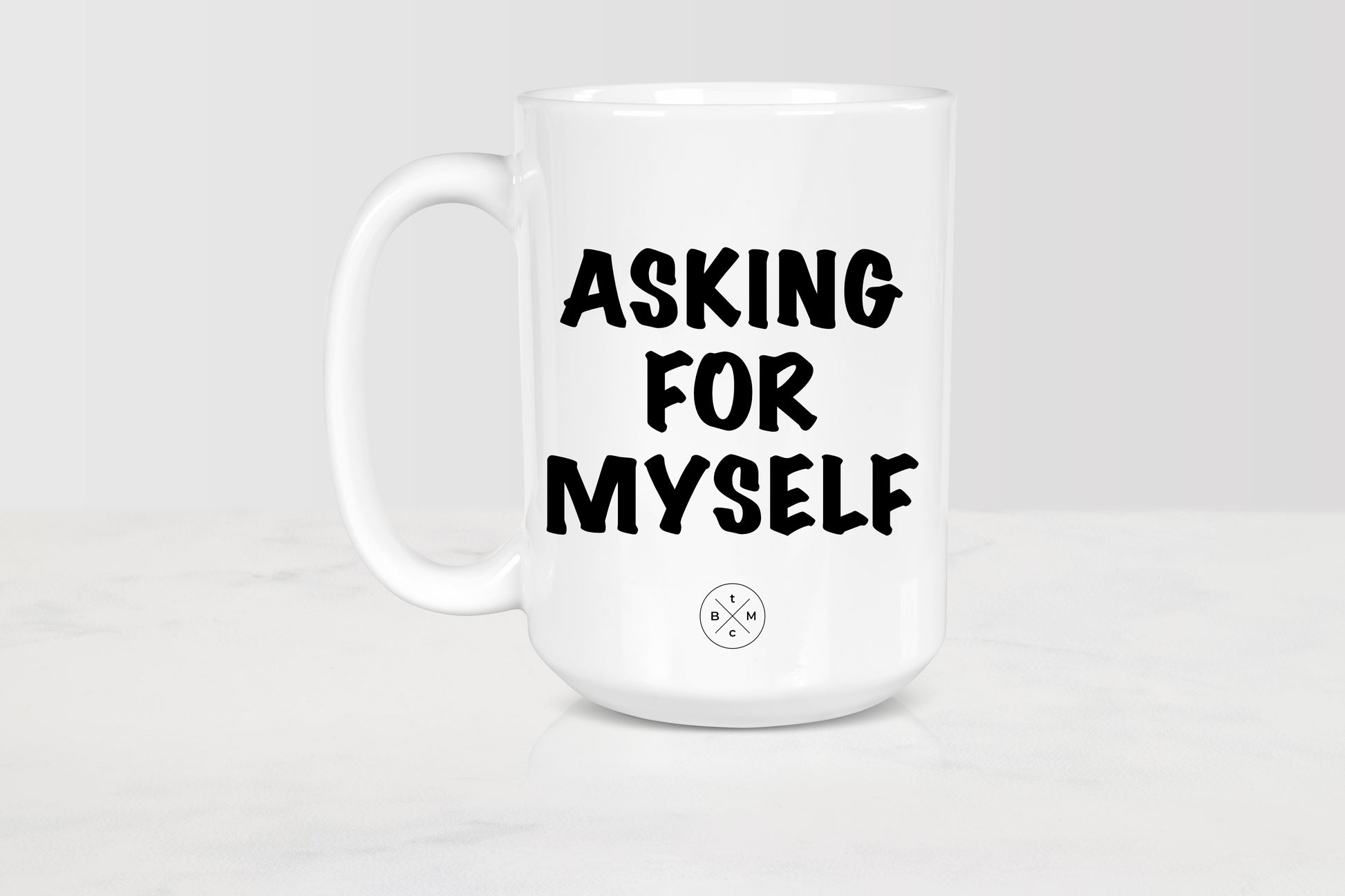 White 15 ounce ceramic mug with black text asking for myself