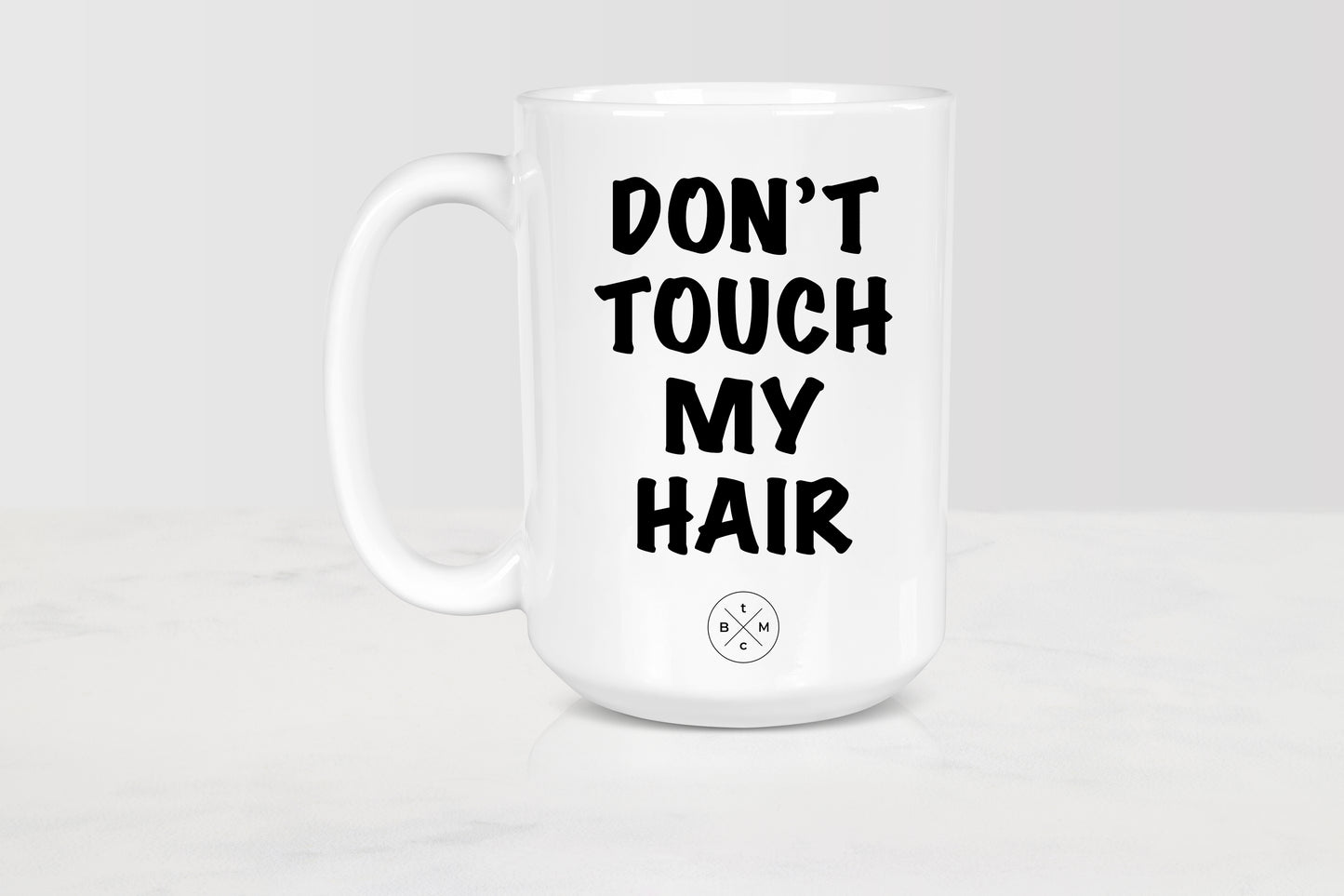 15 ounce white ceramic mug with black text don’t touch my hair