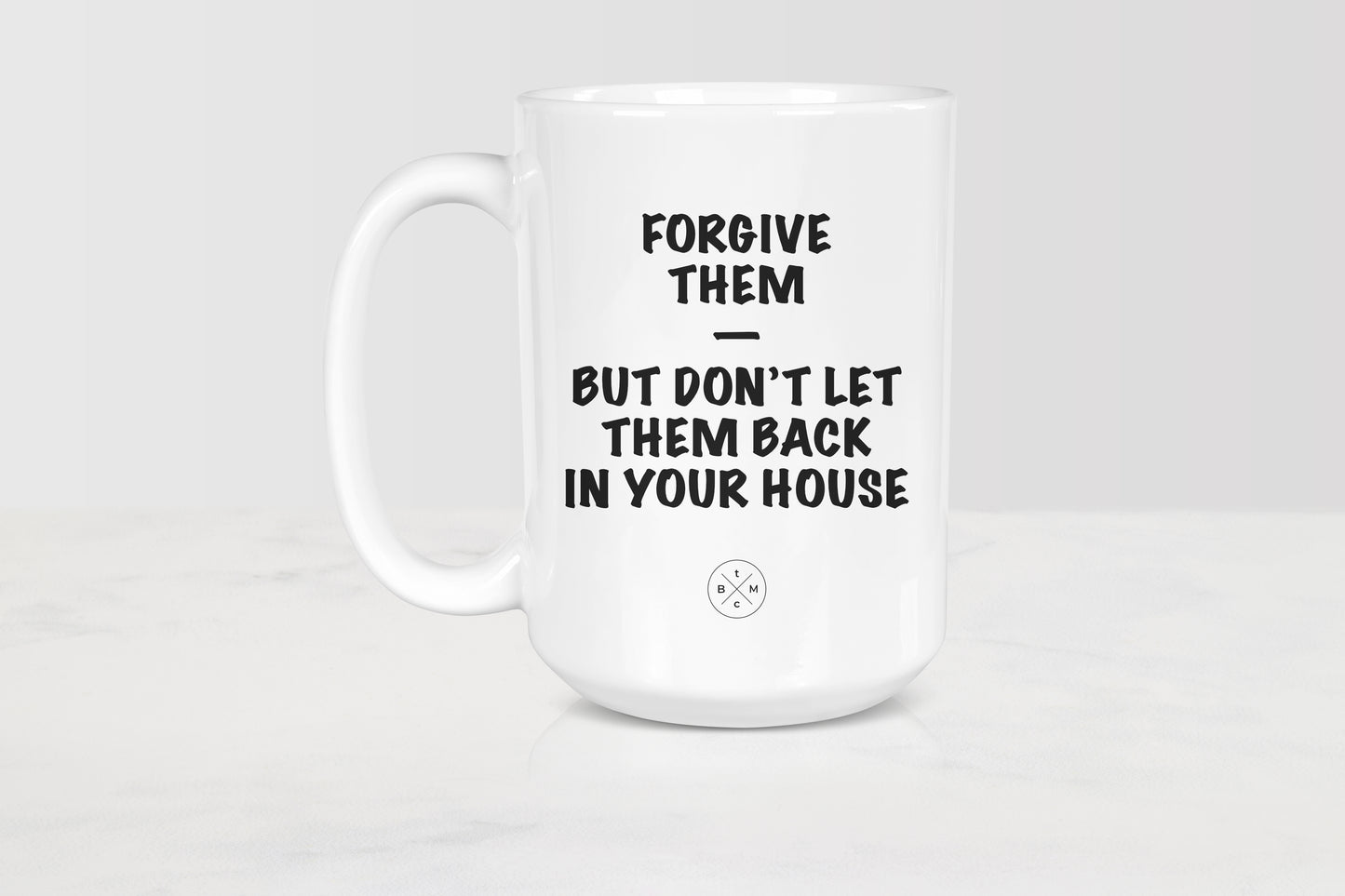 15 ounce white ceramic mug with black text forgive them but don’t let them back in your house