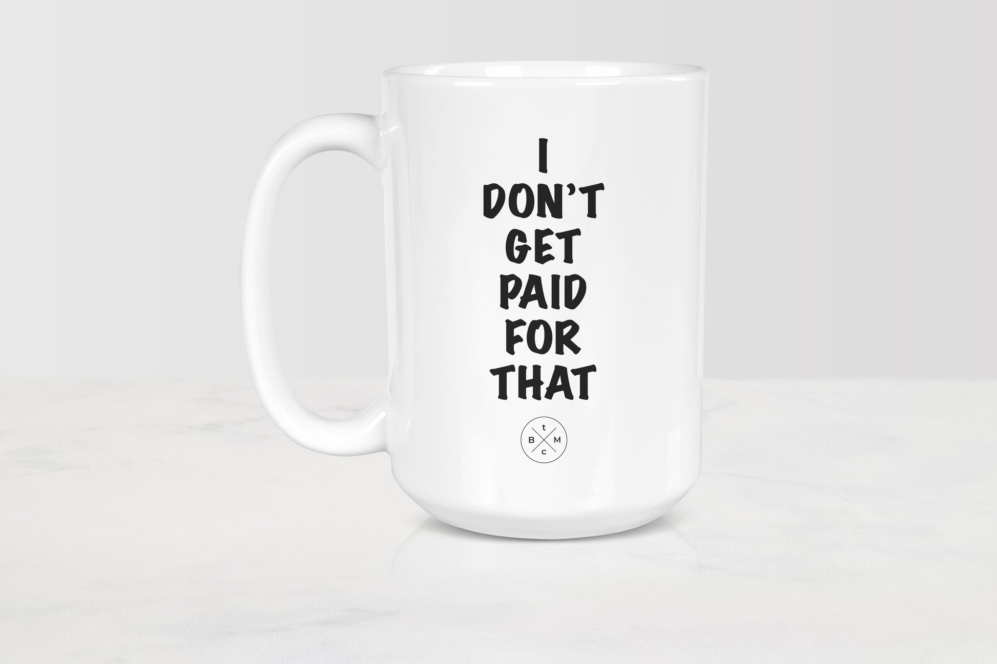 15 ounce  white ceramic mug with black text I don’t get paid for that