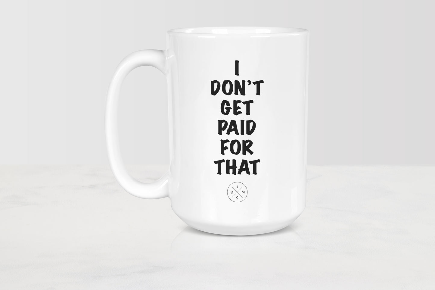 15 ounce  white ceramic mug with black text I don’t get paid for that