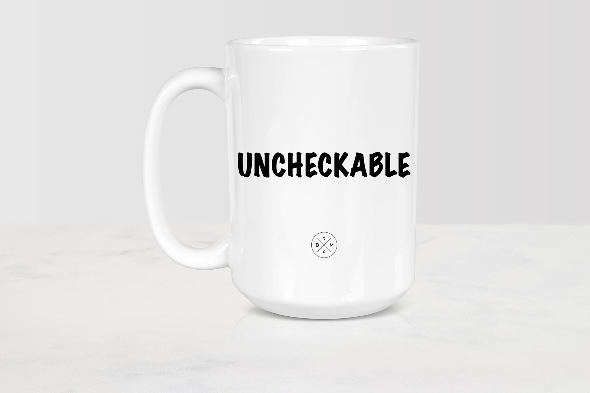 White 15 ounce ceramic mug with black text uncheckable 