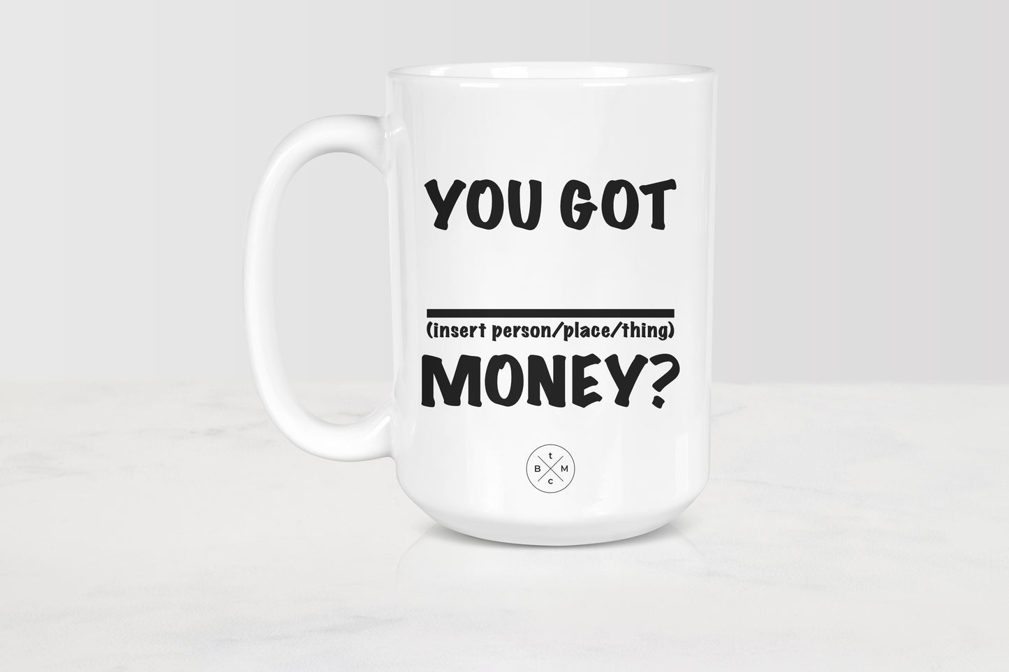 15 ounce white ceramic mug with black text you got blank money 