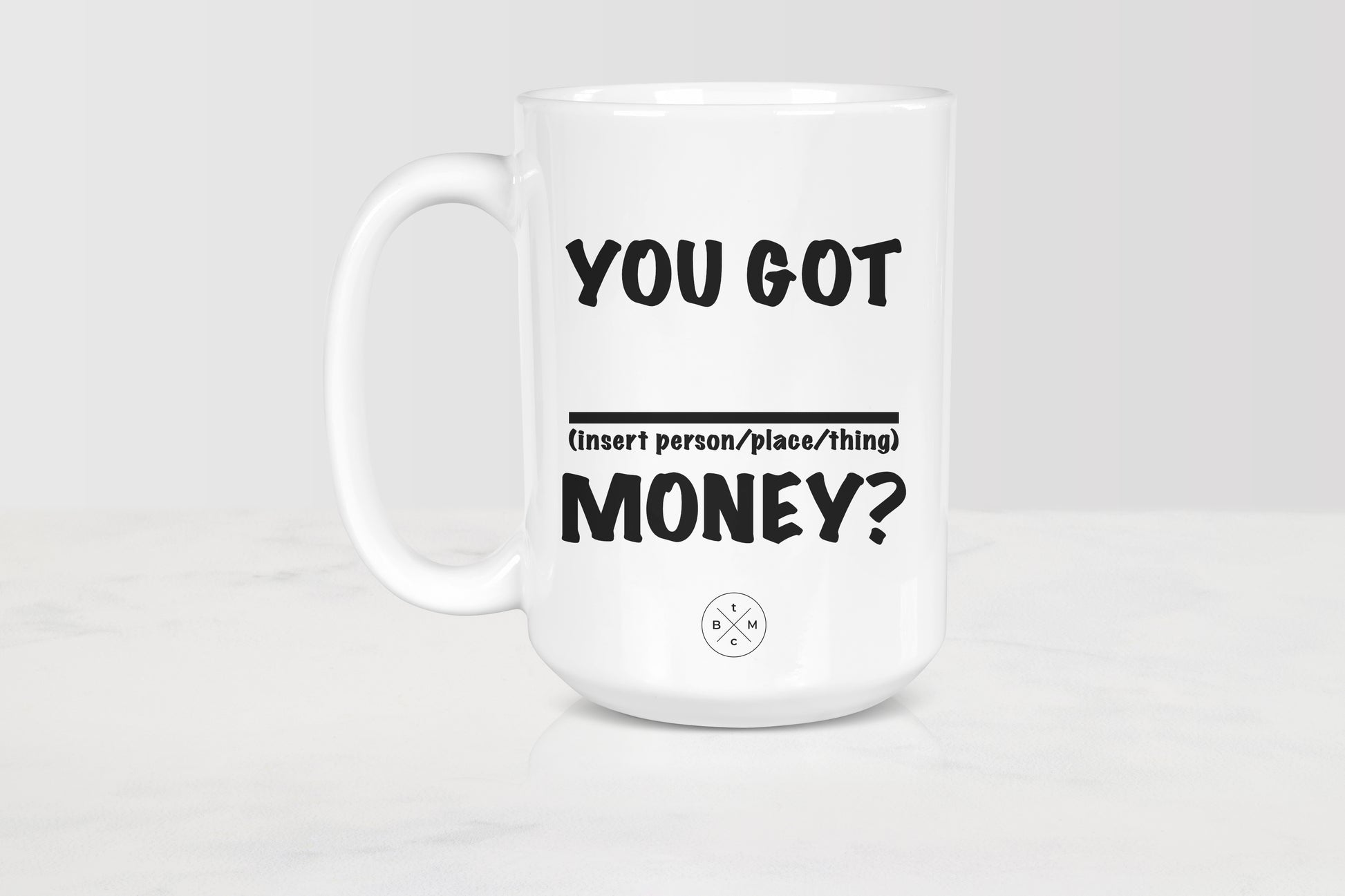 15 ounce white ceramic mug with black text you got blank money 