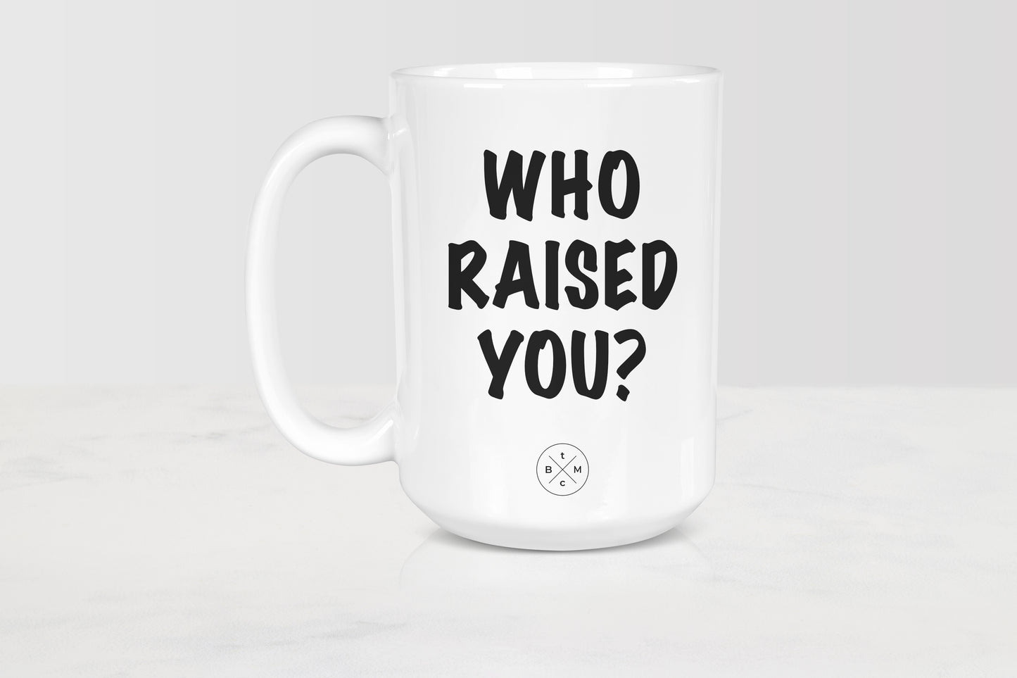 15oz white ceramic mug with black text who raised you?