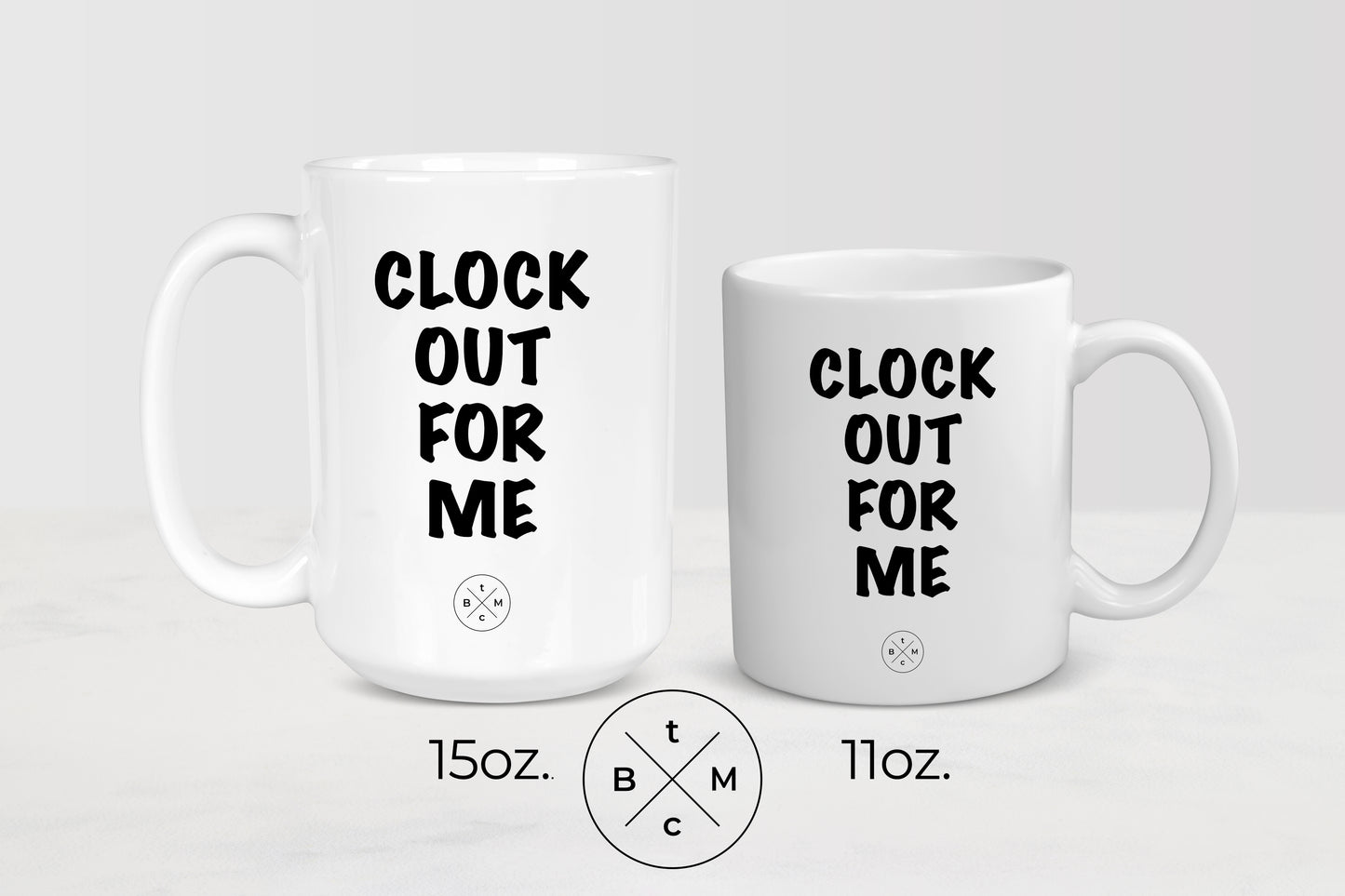 11 ounce and 15 ounce white ceramic mugs with black text clock out for me