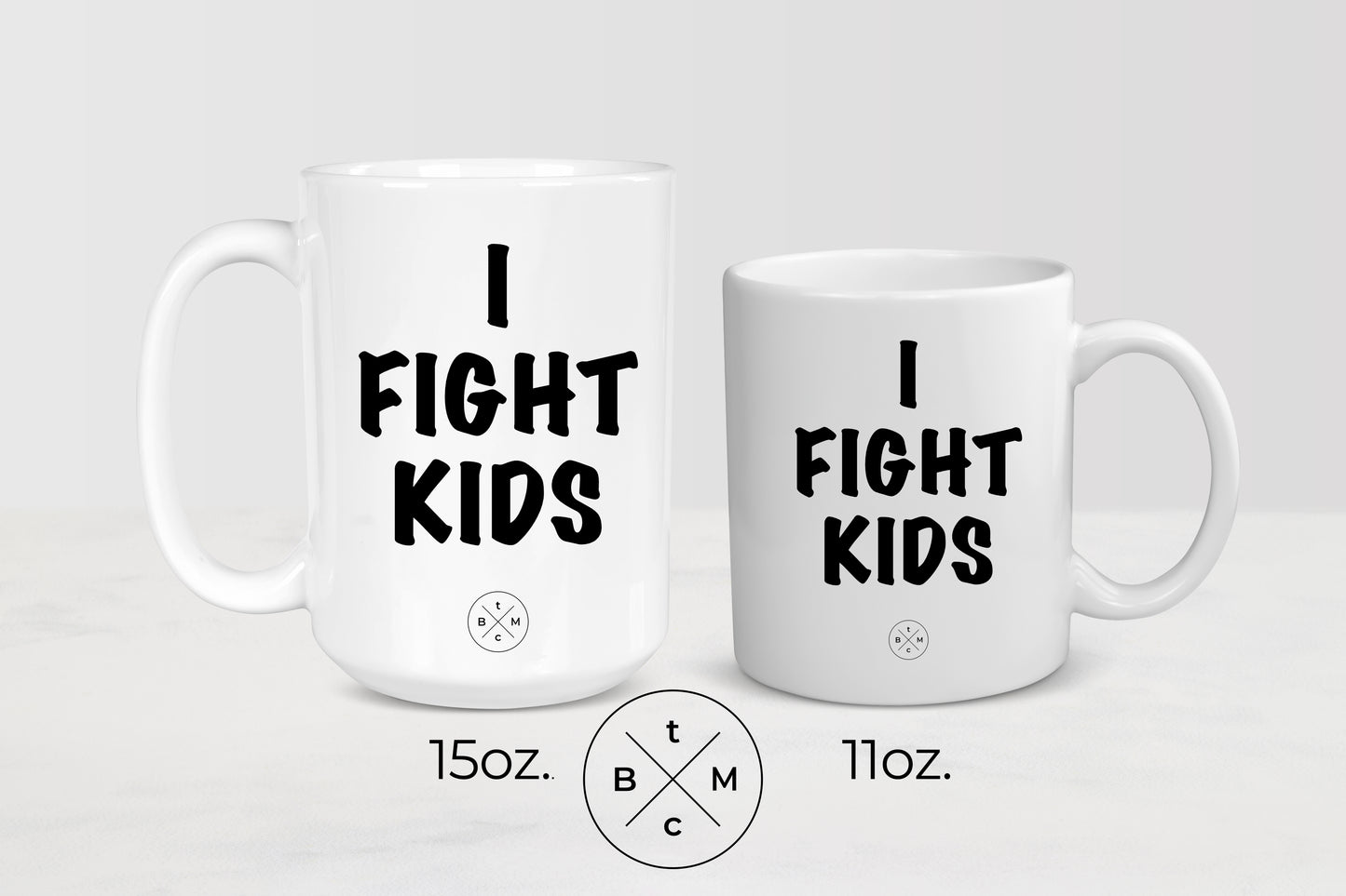 White 11 ounce and 15 ounce ceramic mugs with black text I fight kids