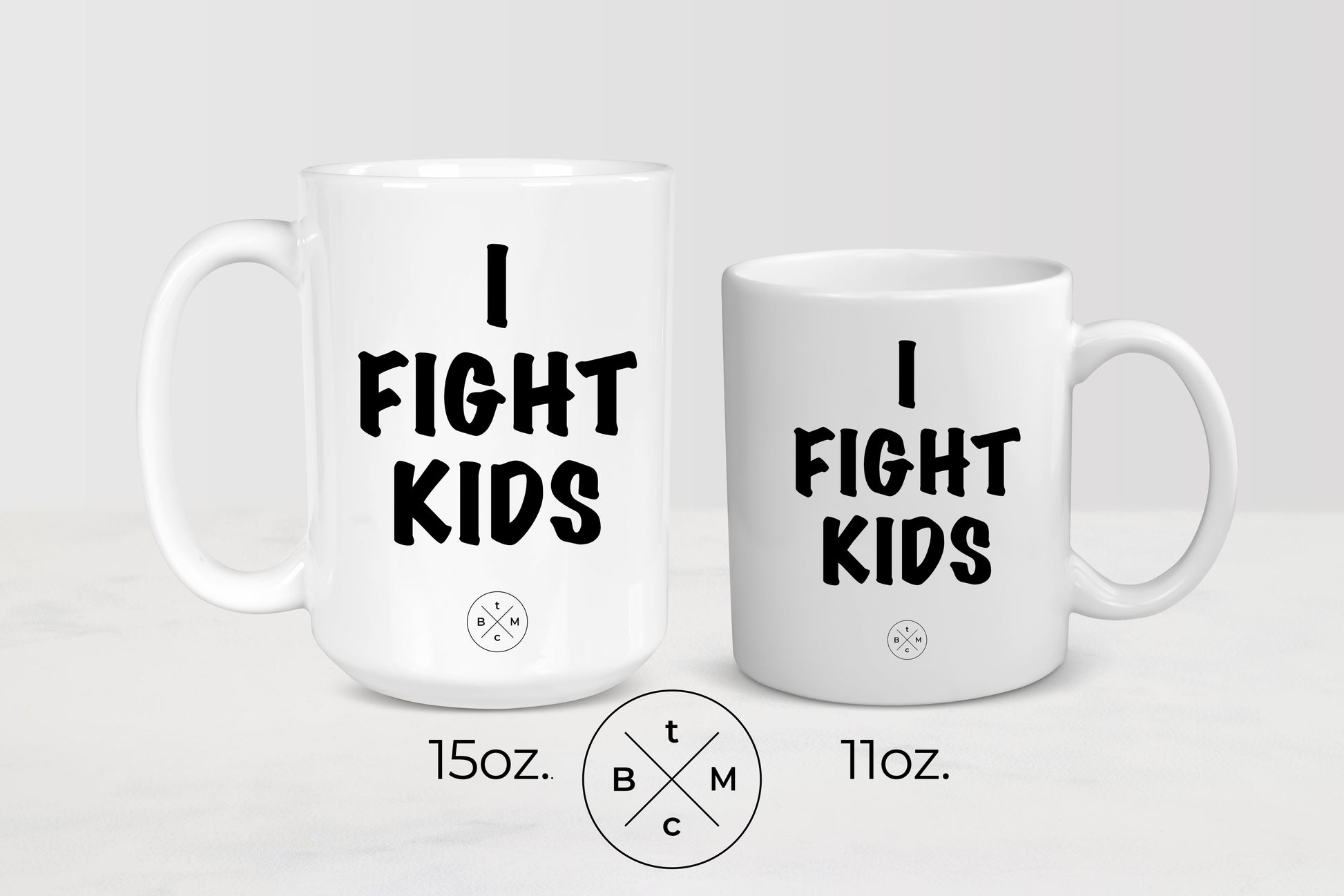 White 11 ounce and 15 ounce ceramic mugs with black text I fight kids