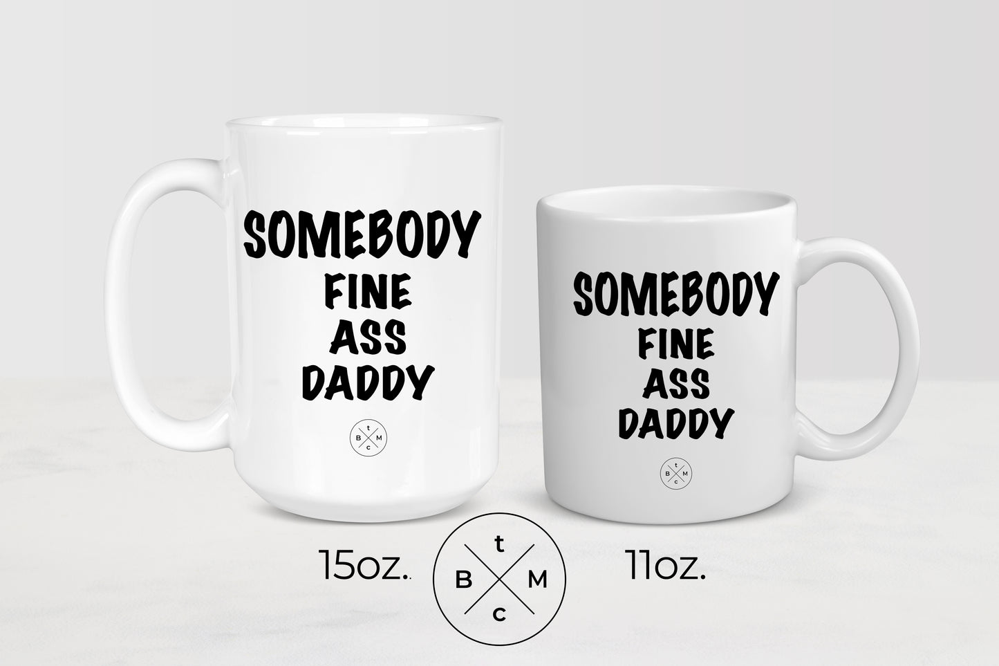 11 ounce and 15 ounce white ceramic mugs with black text somebody fine ass daddy