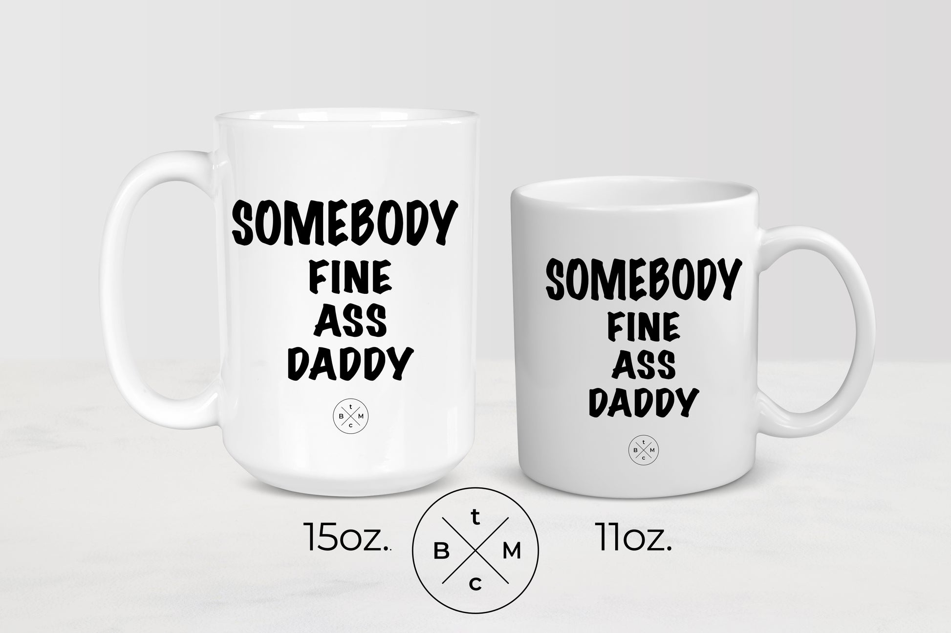 11 ounce and 15 ounce white ceramic mugs with black text somebody fine ass daddy