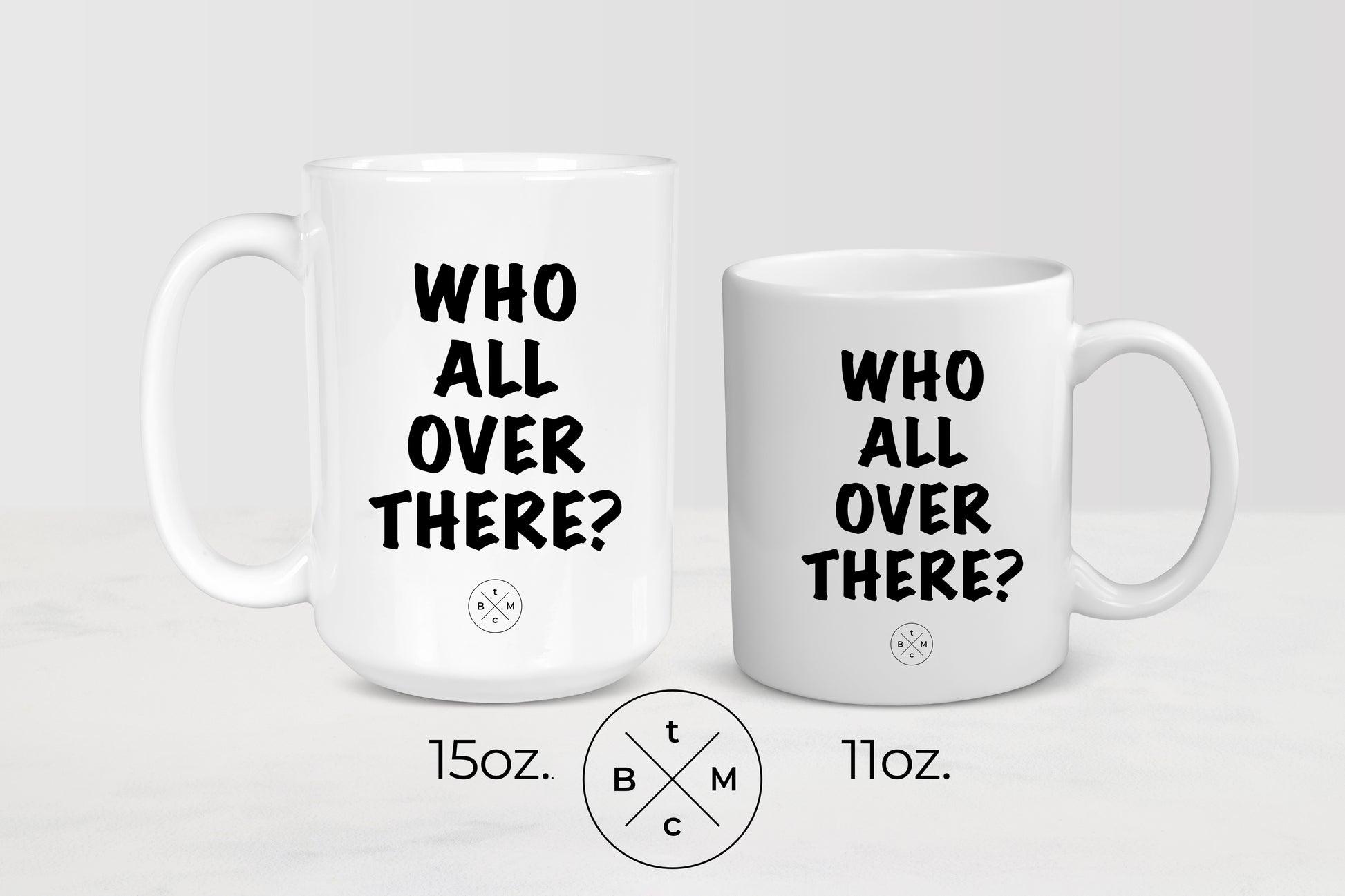 11 ounce and 15 ounce white ceramic mugs with black text who all over there?