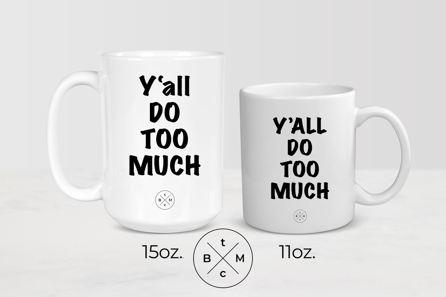 11 and 15 ounce white ceramic mugs with black text y’all do too much