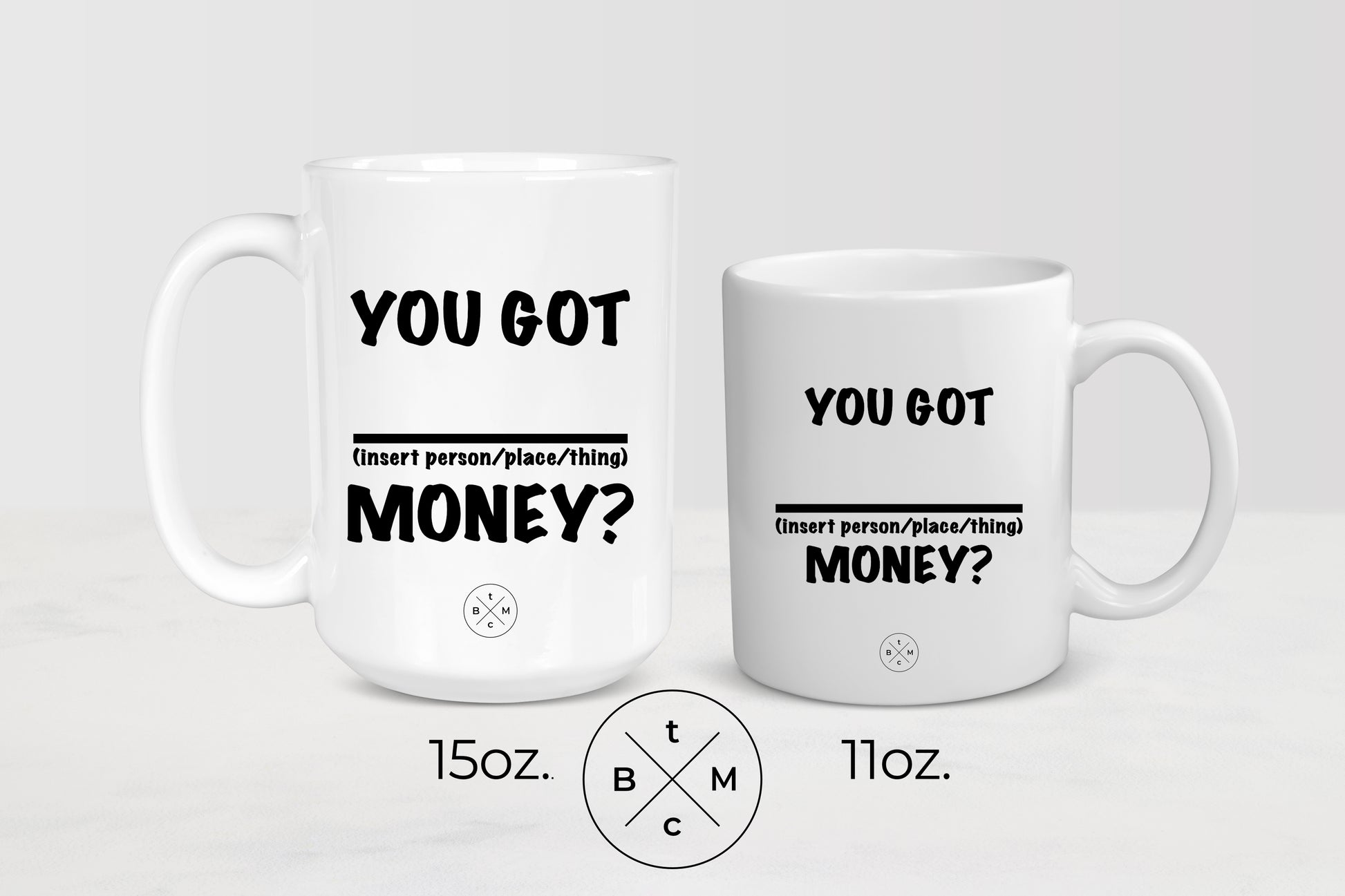 11 ounce and 15 ounce white ceramic mugs with black text you got blank money 